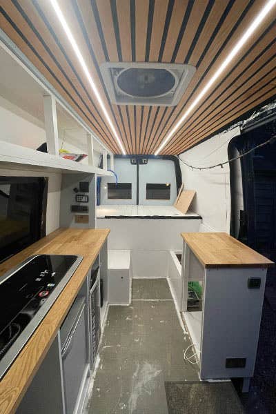 An image of the rear of Al and Maddy's Mercedes Sprinter, showing the MaxxFan Deluxe unit installed in the roof